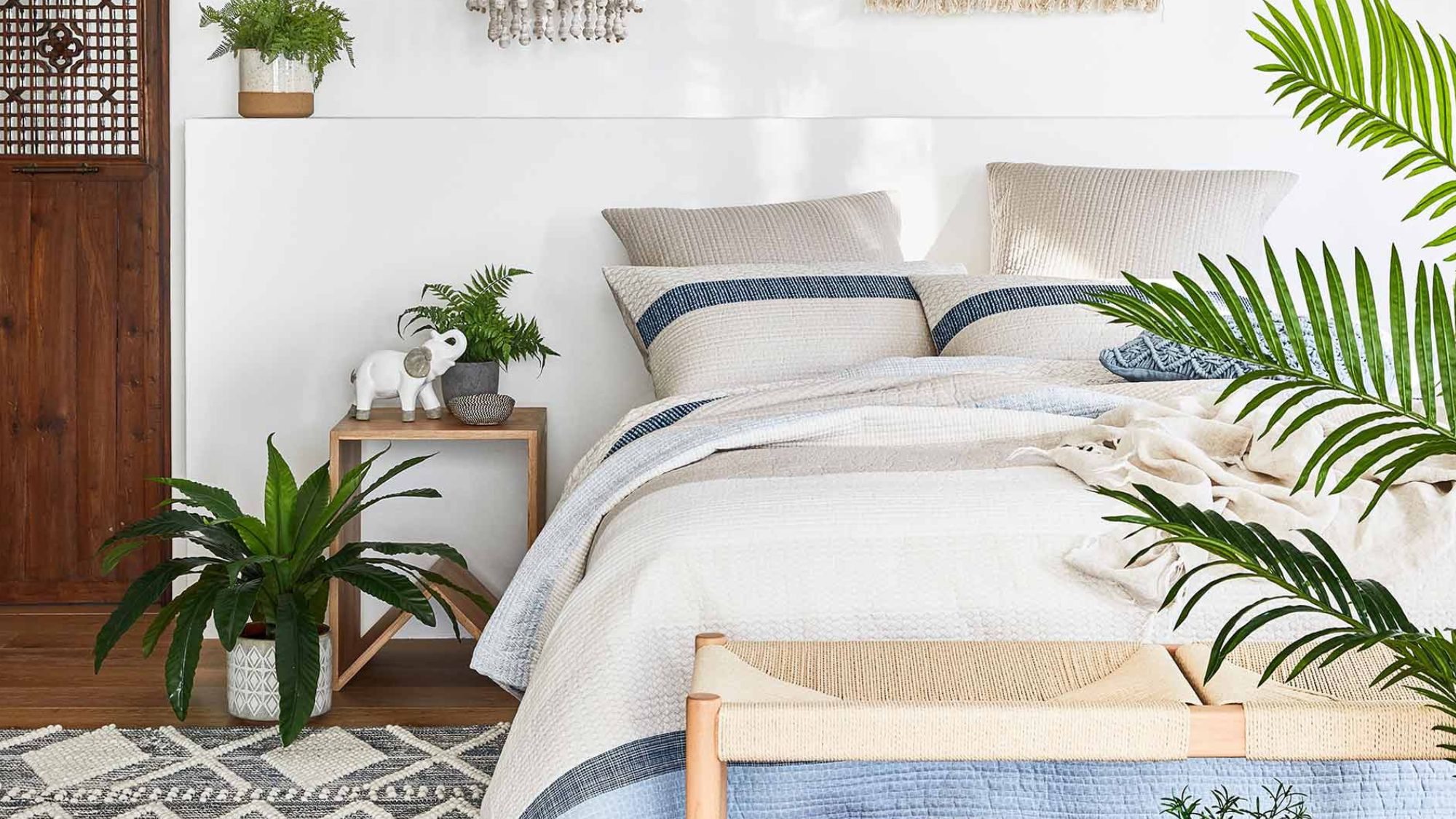 A bedroom with Feng Shui principles and plants