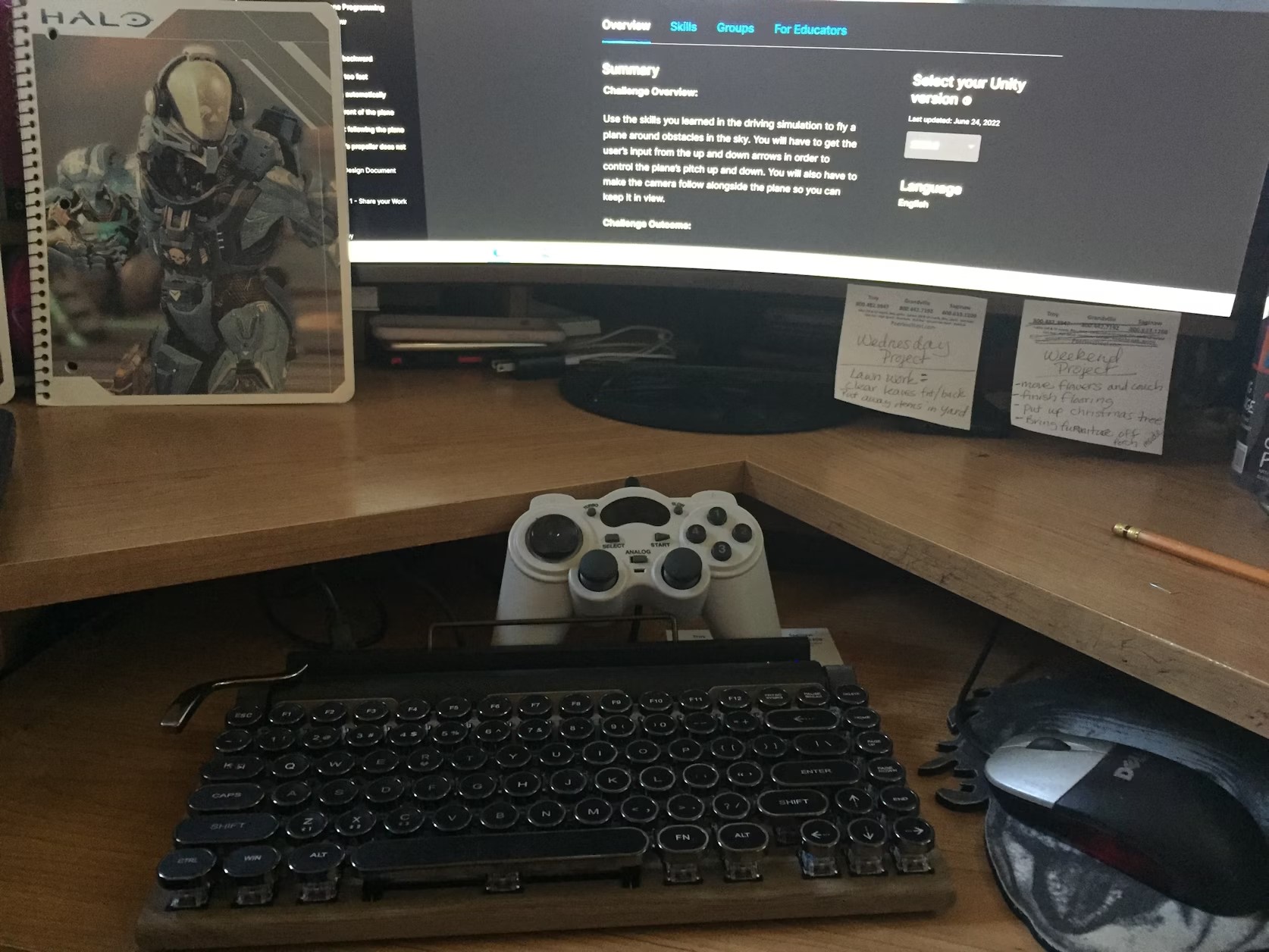 https://unsplash.com/photos/a-computer-desk-with-a-keyboard-and-a-monitor-Xfk_WfZ1GTU